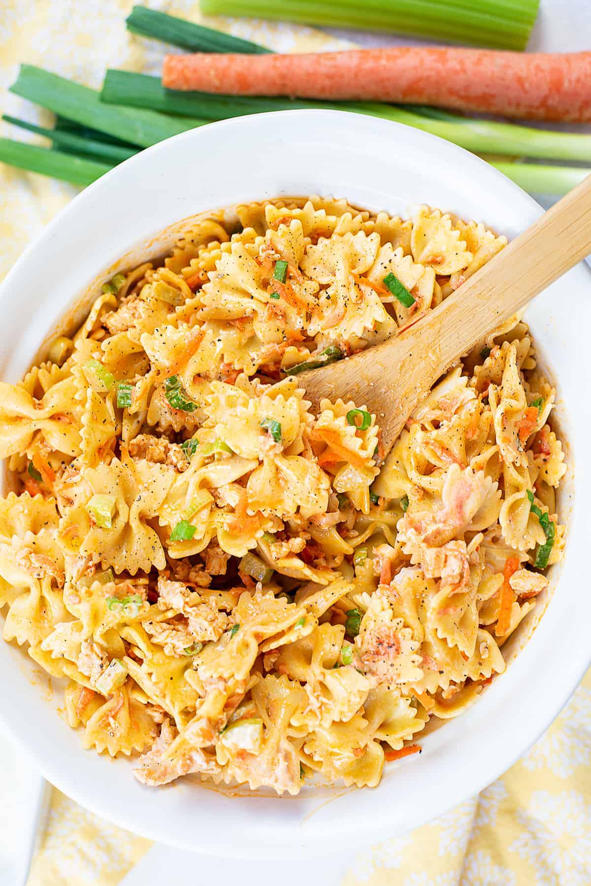 buffalo chicken pasta salad in white bowl.