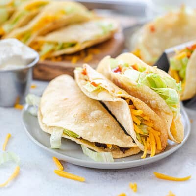 platefull of crispy fried tacos.