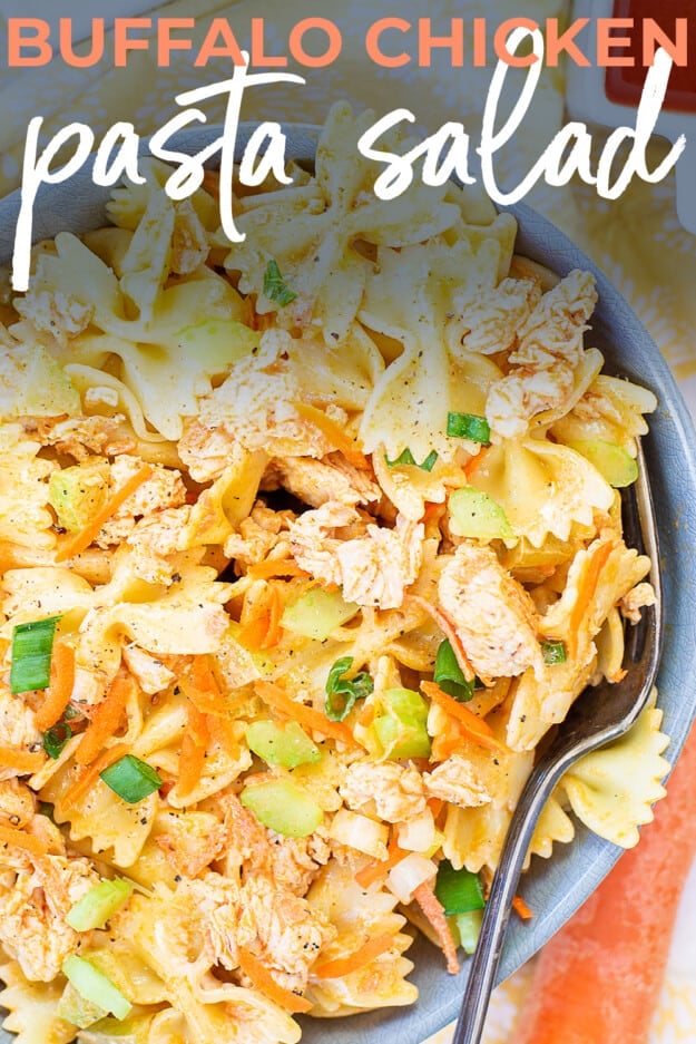 buffalo chicken pasta salad in bowl with fork.