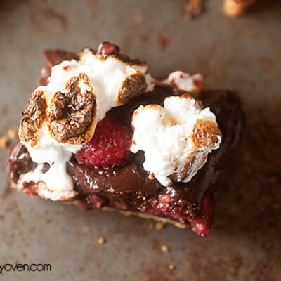 A raspberry smores bar on a baking sheet.