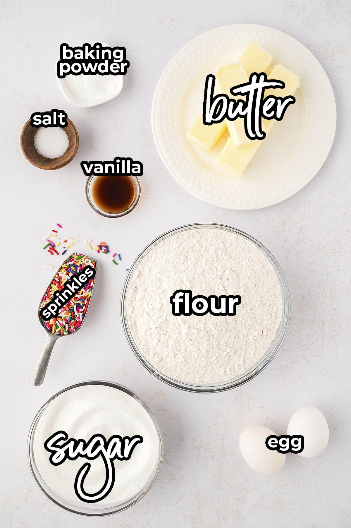 Ingredients for sugar cookies with sprinkles.