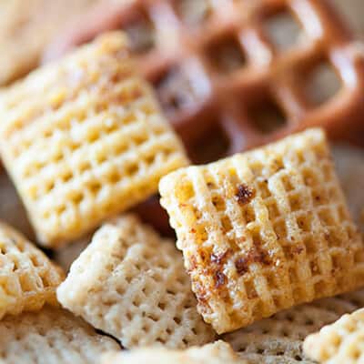 A close up of seasoned Chex cereal.