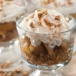 Caramel apple crisp in a clear Sunday glass.