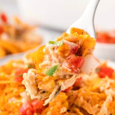 Fork full of Dorito chicken casserole.