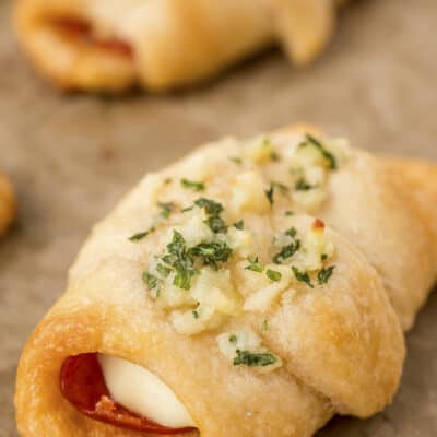 Pizza roll on baking sheet.