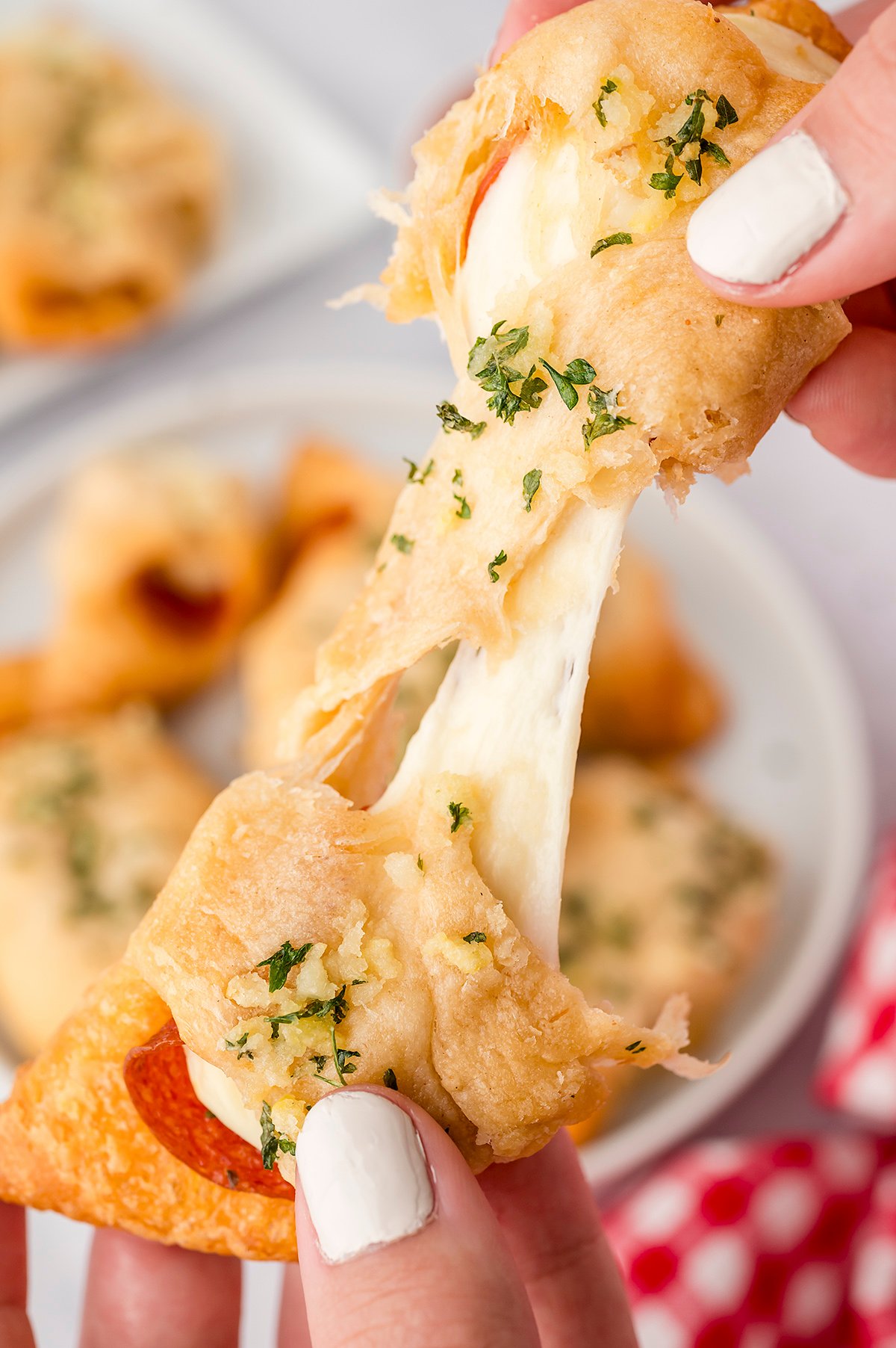 Cheesy pepperoni pizza rolls at home!