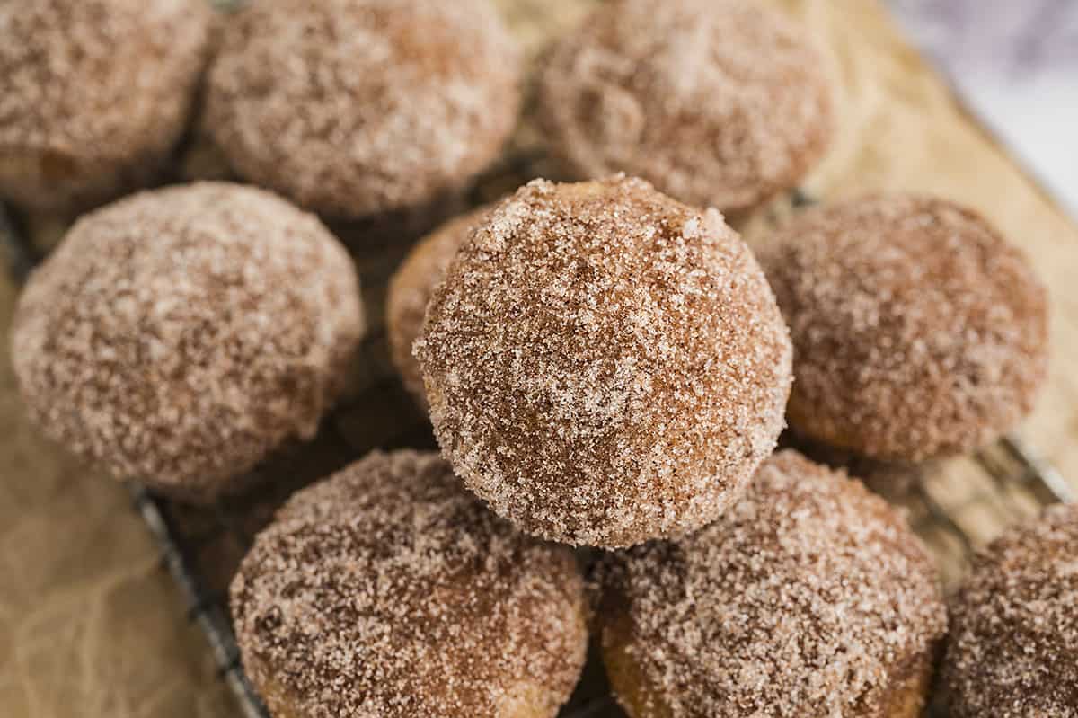 Easy baked donut muffins filled with applesauce for a perfect fall breakfast!