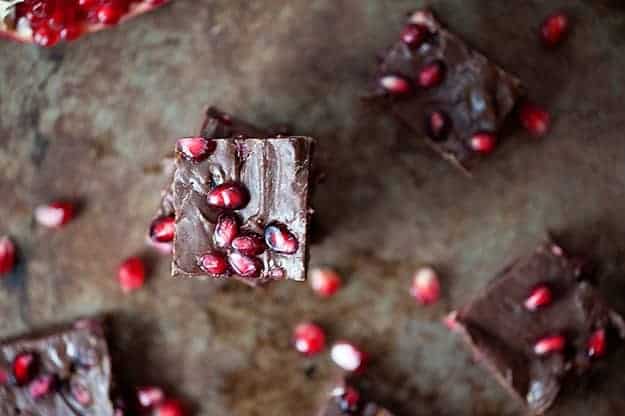 An overhead view of chocolate pomegranate squares.