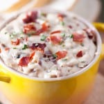 Onion dip in a yellow bowl.