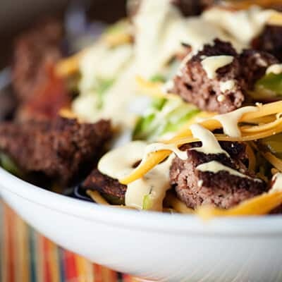 A close up of a bowl of cheeseburger salad.