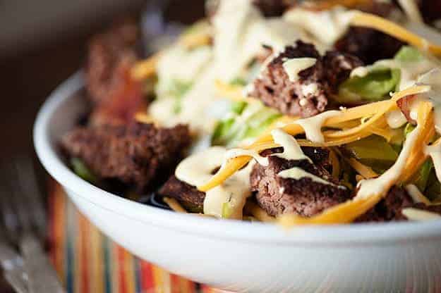 A close up of a bowl of cheeseburger salad.