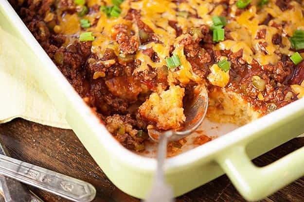 Sloppy joe cornbread in a nine by thirteen baking dish.