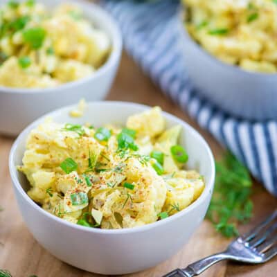 keto potato salad in small bowls.