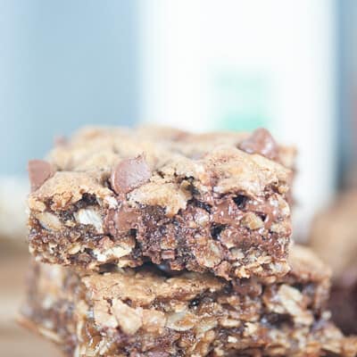 A close up of a stack of oatmeal bar squares.