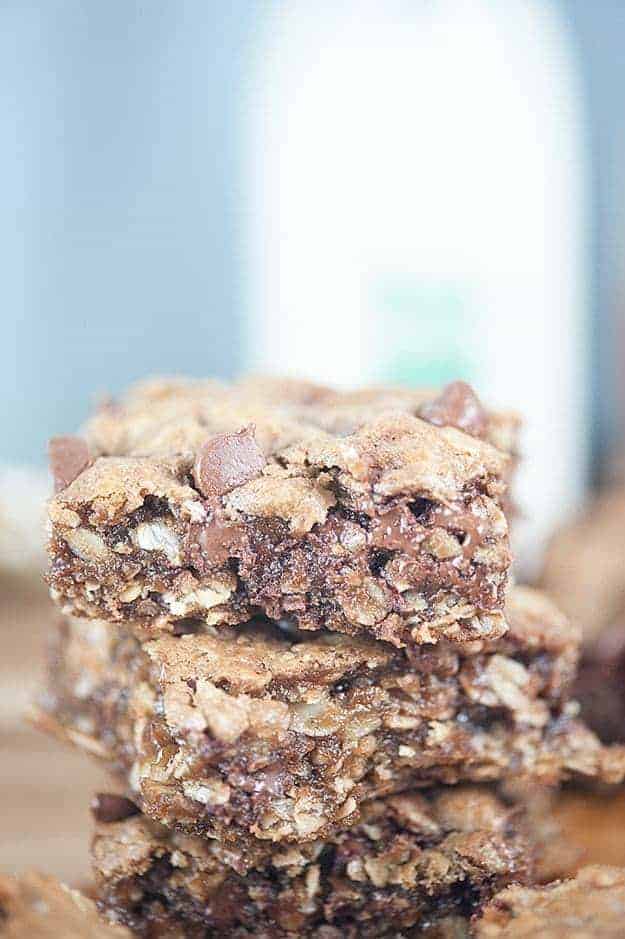 A close up of a stack of oatmeal bar squares.