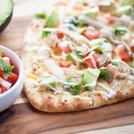 This quick and easy dinner recipe is ready in just 20 minutes! Mexican Chicken Flatbread... healthy, quick, and loaded with chicken, cheese, and pico de gallo!