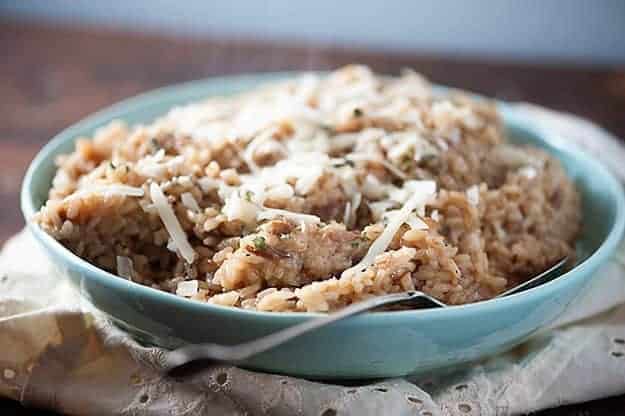 A side view of rice in a white bowl.