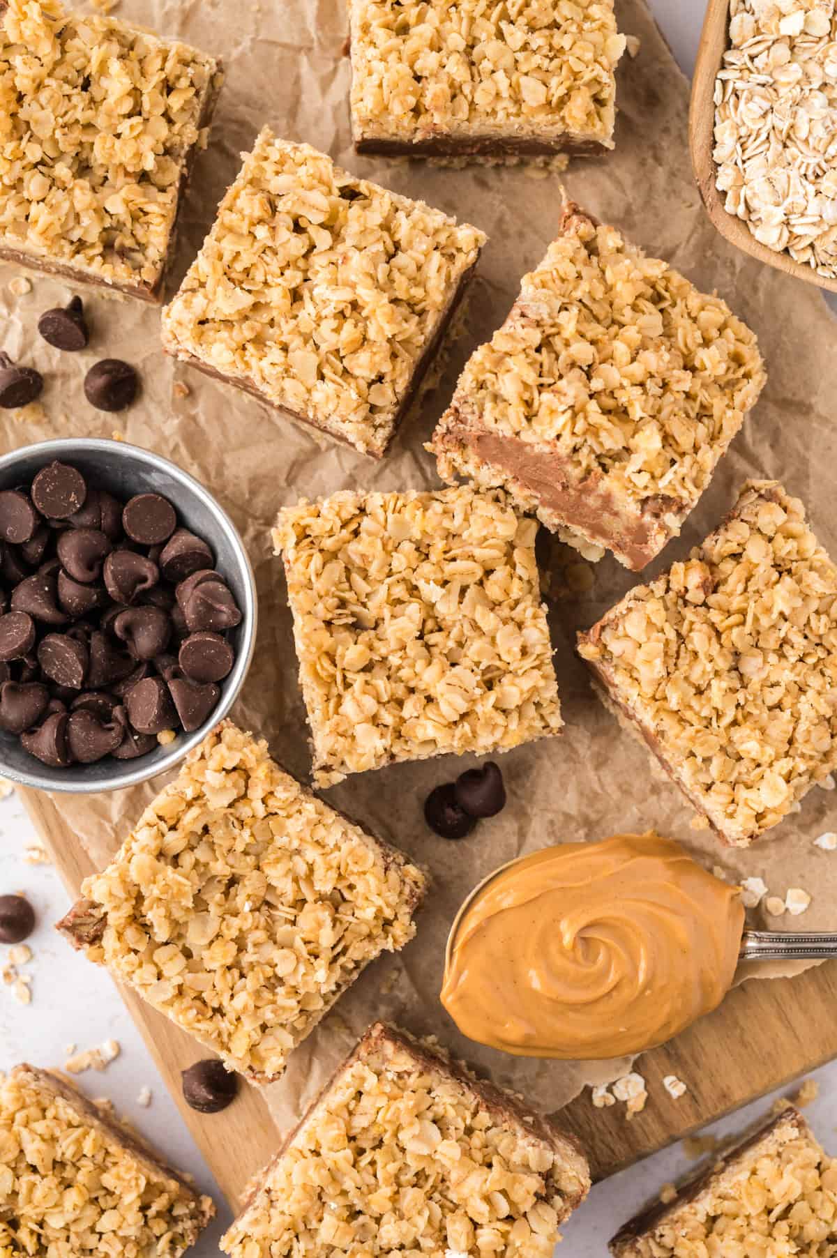 No bake chocolate oatmeal bars on wooden board.