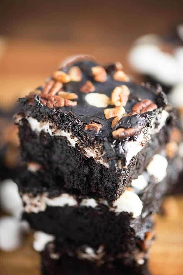 A stack of Mississippi mud brownies cut into squares.