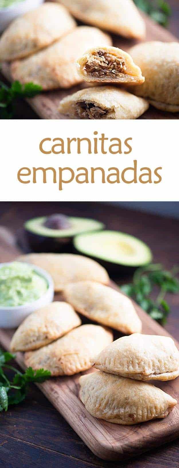 Empanadas on a narrow cutting board in front of an avocado cut in half.