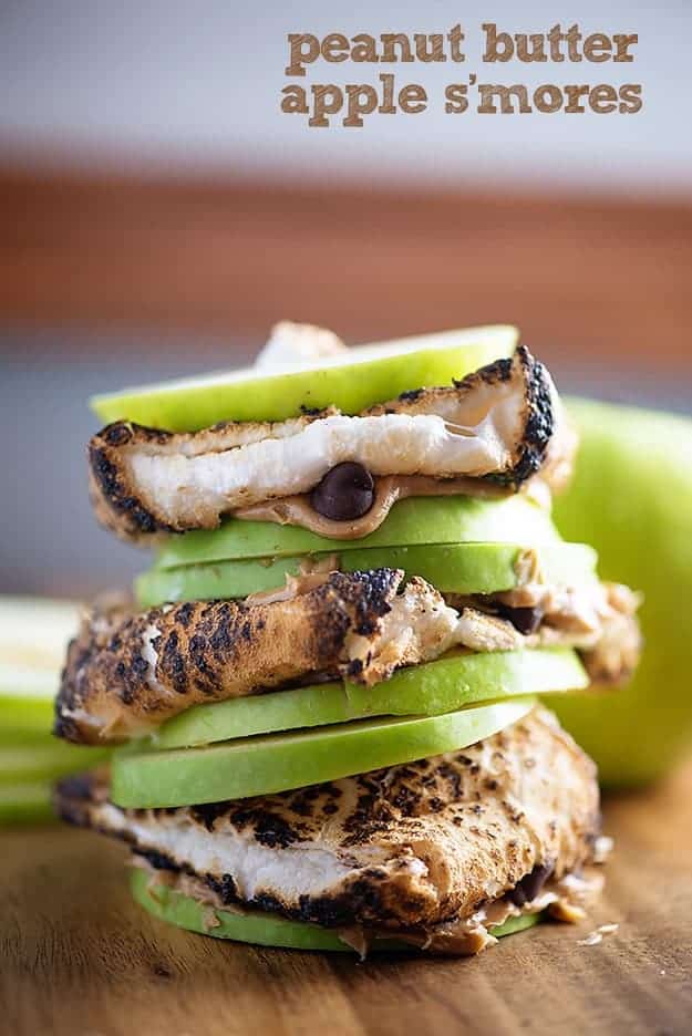 S'mores made with apple slices, peanut butter, and chocolate chips! 