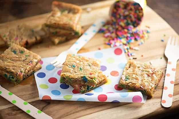 Cake Batter Blondies - one bowl recipe that's ready in less than 30 minutes! Chewy and full of sprinkles!