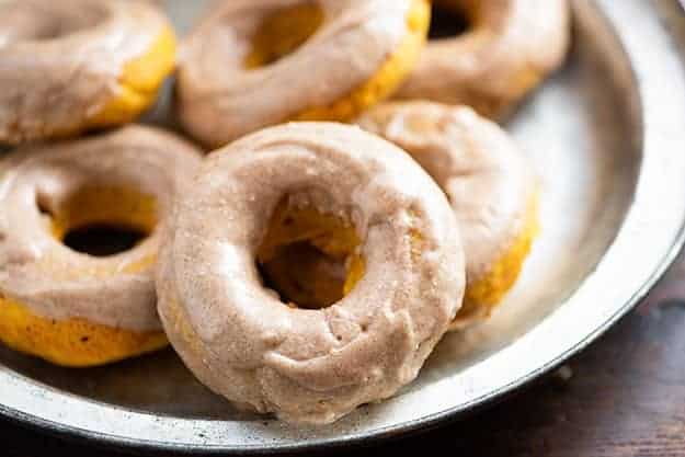 Baked pumpkin donuts with browned butter glaze! These easy donuts are full of pumpkin and topped with an amazing glaze!