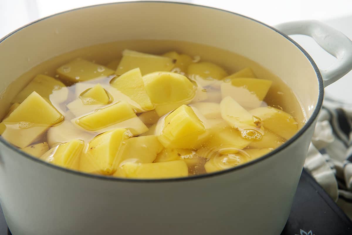 potatoes in pot of water.