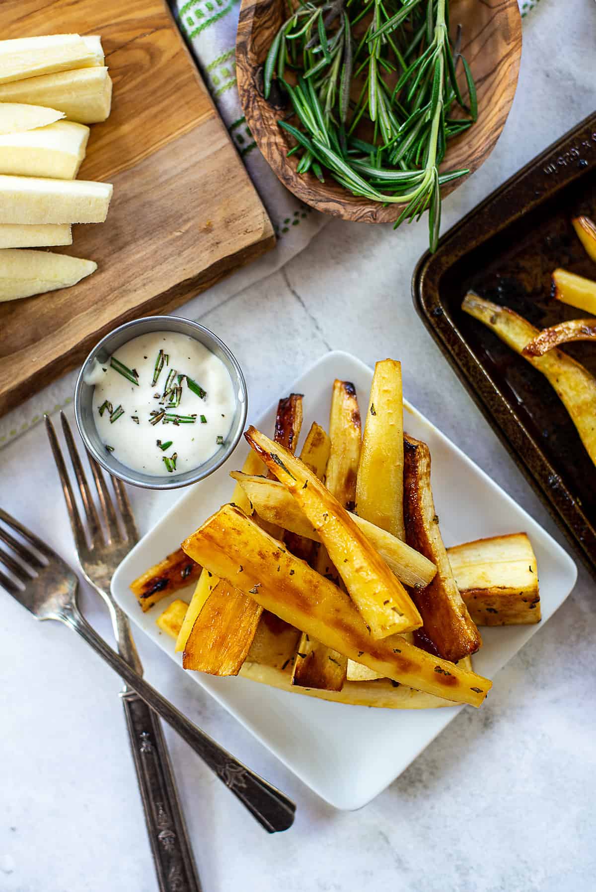 overhead view of parsnip fries on plate.