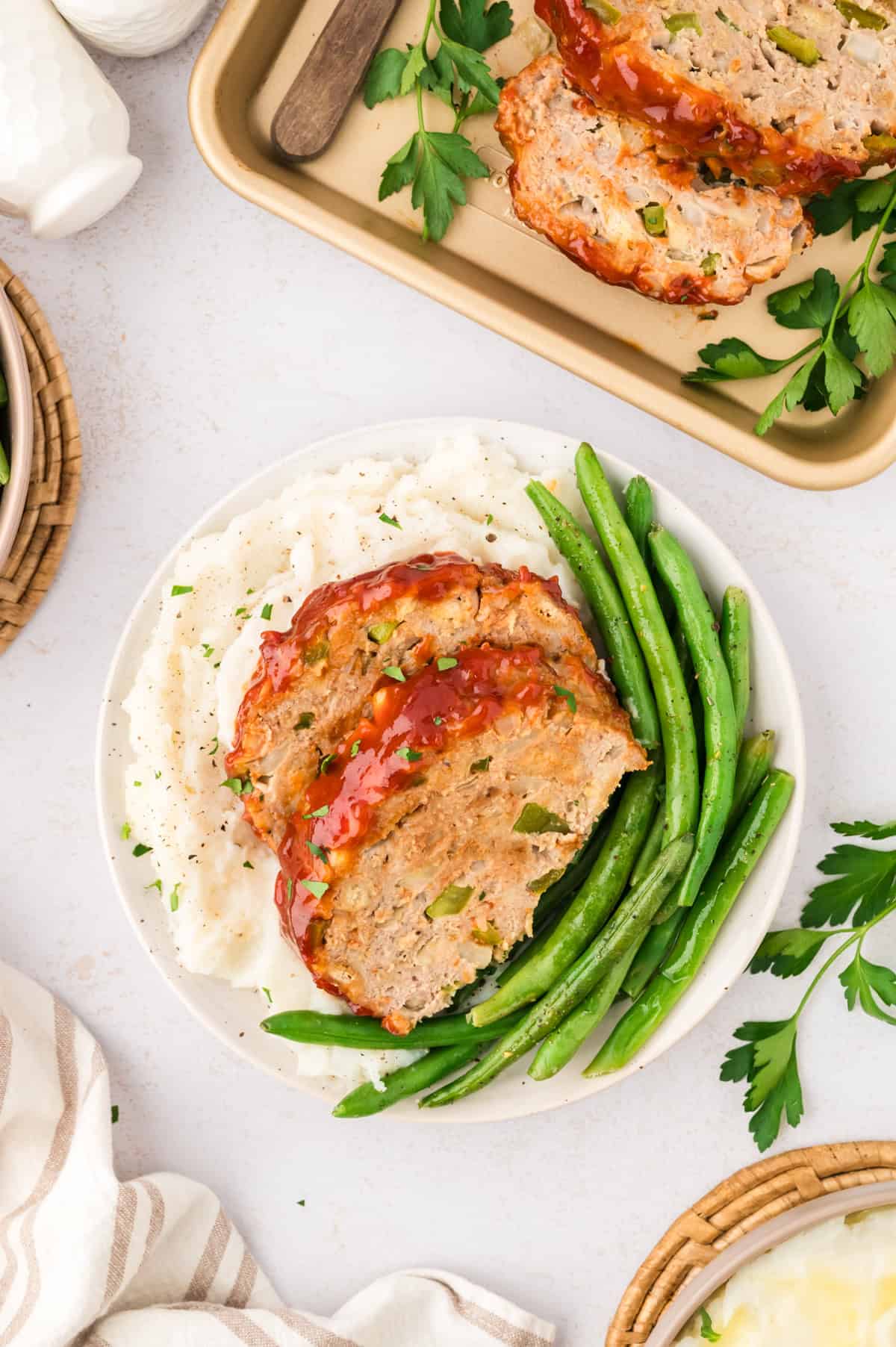 sliced turkey meatloaf with text for Pinterest.