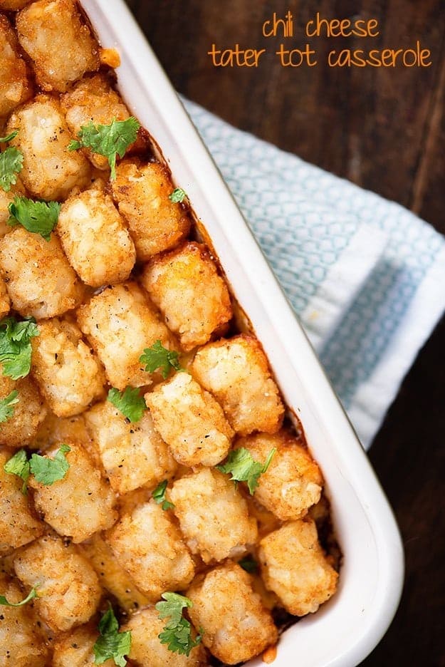 Tater tots in a white baking pan.