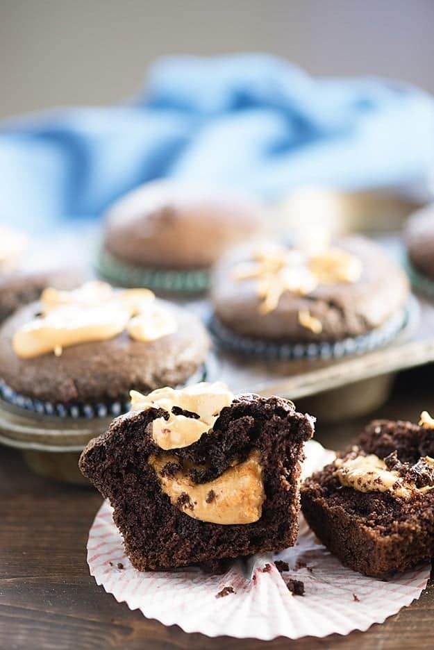 These moist chocolate muffins are filled with a creamy peanut butter center! These are the muffins of my dreams!!