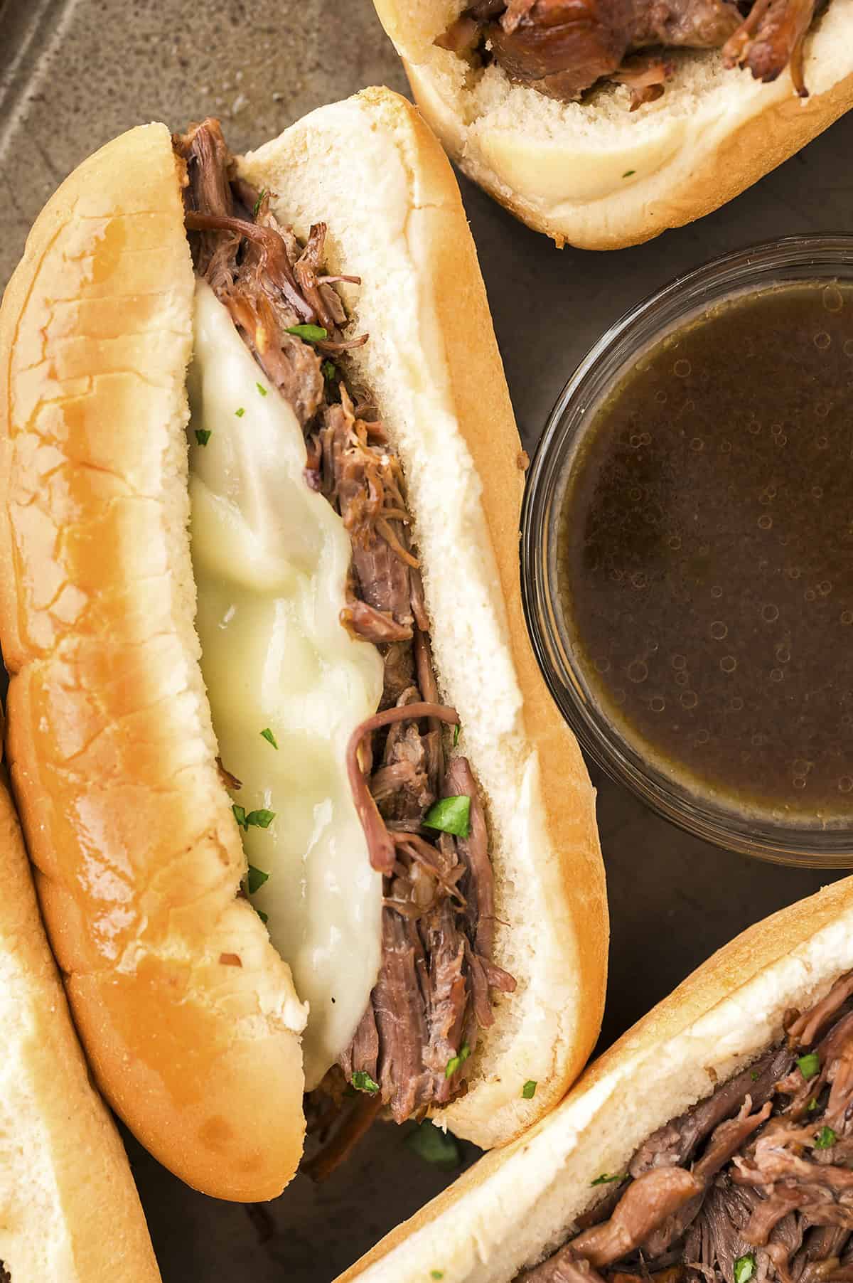 French dip sandwich with melty cheese.