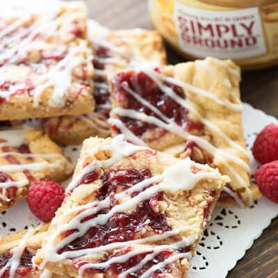 Shortbread bars on a white laced placemat.