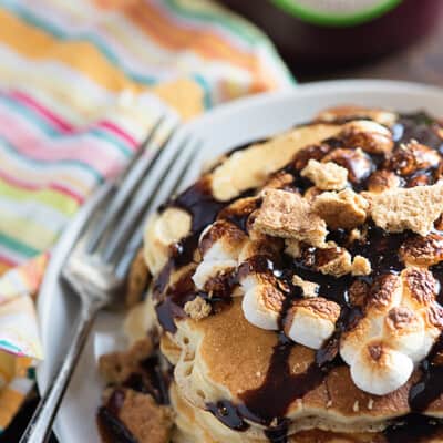 S'mores Pancakes - toasty marshmallows, chocolate syrup, and graham crackers for breakfast! So good!