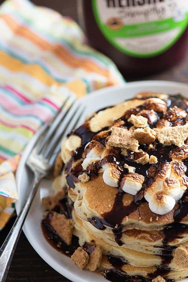 S'mores Pancakes - toasty marshmallows, chocolate syrup, and graham crackers for breakfast! So good!