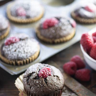 These chocolate muffins are so moist and easy to make! We love the tart raspberries hidden inside!