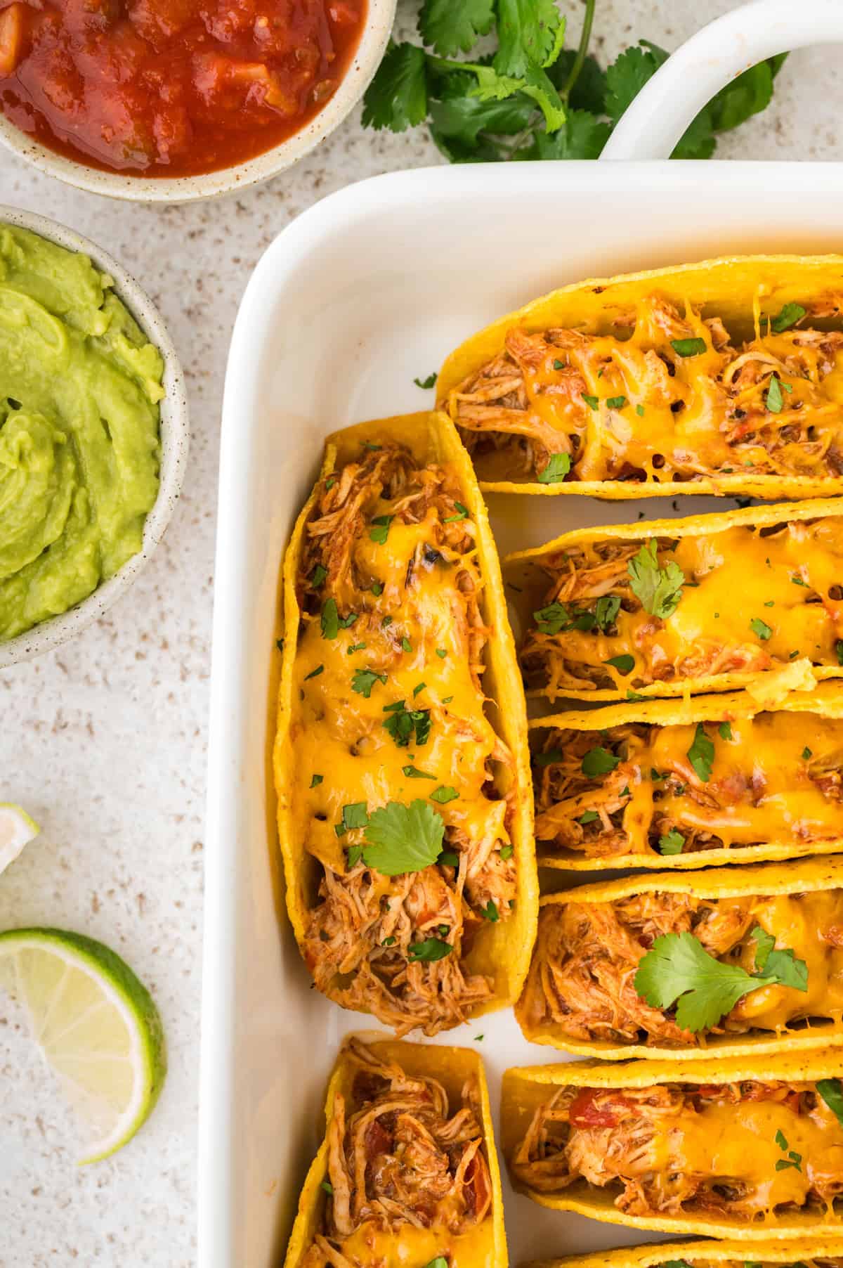 crockpot chicken tacos on cutting board