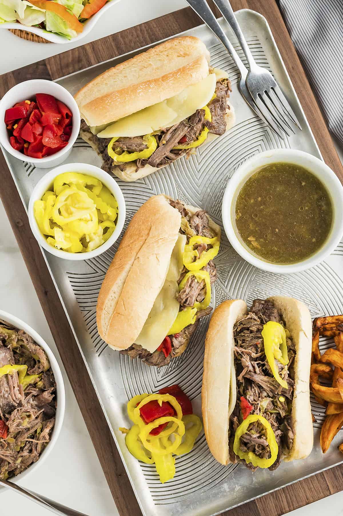 Italian beef sandwiches on sheet pan.