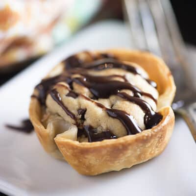 A close up of a mini chocolate chip cookie pie.