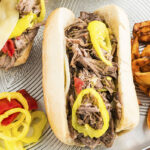 We love this simple slow cooker recipe for Italian beef sandwiches. Just a handful of ingredients and these are SO GOOD!