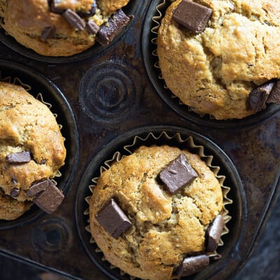 My kids and I LOVE these fluffy chocolate chunk banana muffins.