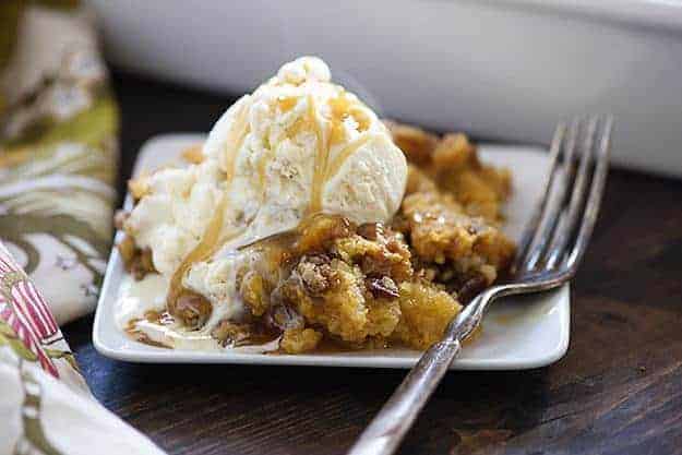 This pumpkin crunch cake has a cake topping with a bottom made of pumpkin pie filling! I couldn't stop sneaking bites of this cake!