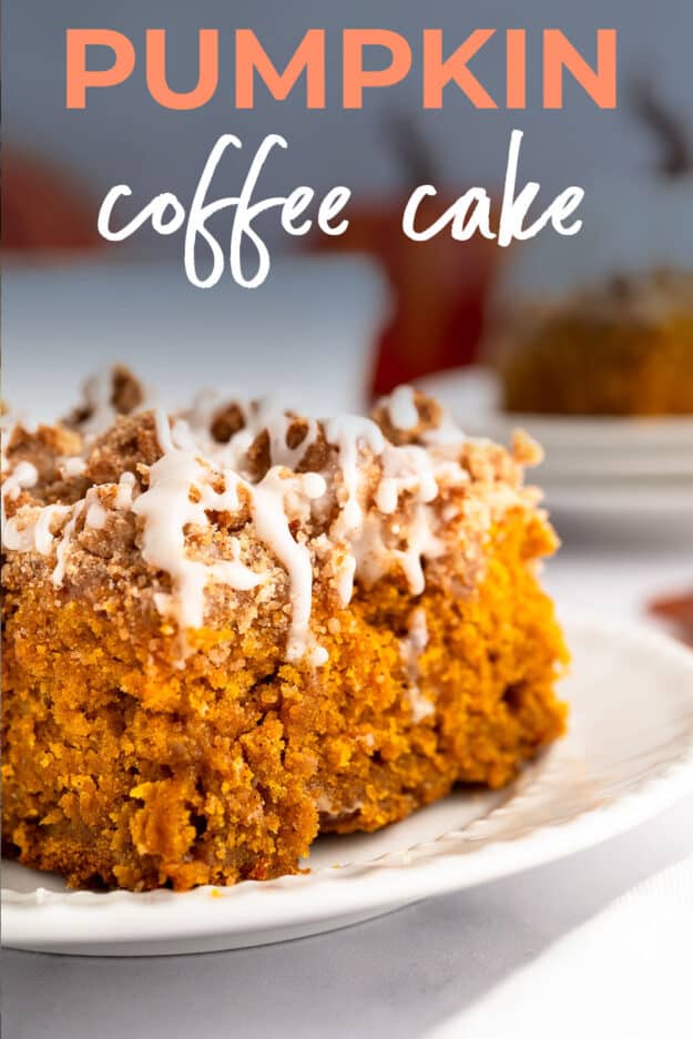 Close up of slice of pumpkin coffee cake on white plate.