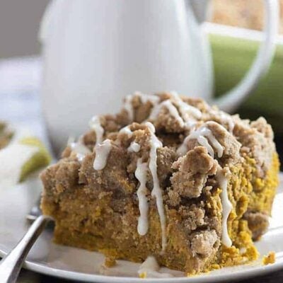 This pumpkin coffee cake is super moist and dense, kind of like a pumpkin pie. The huge streusel topping is so good, too!