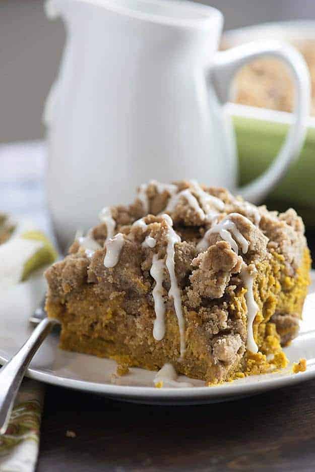 This pumpkin coffee cake is super moist and dense, kind of like a pumpkin pie. The huge streusel topping is so good, too!