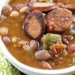 A bowl sausage and bean soup.