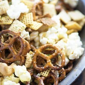 This snack mix is all mixed up with my favorite flavor - dill pickles! You'll love the dill pickle cashews with the crunchy cereal, pretzels, and popcorn!