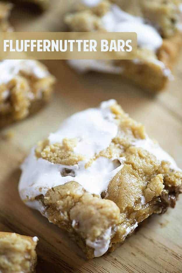 A close up of a fluffernutter bar on a cutting board.