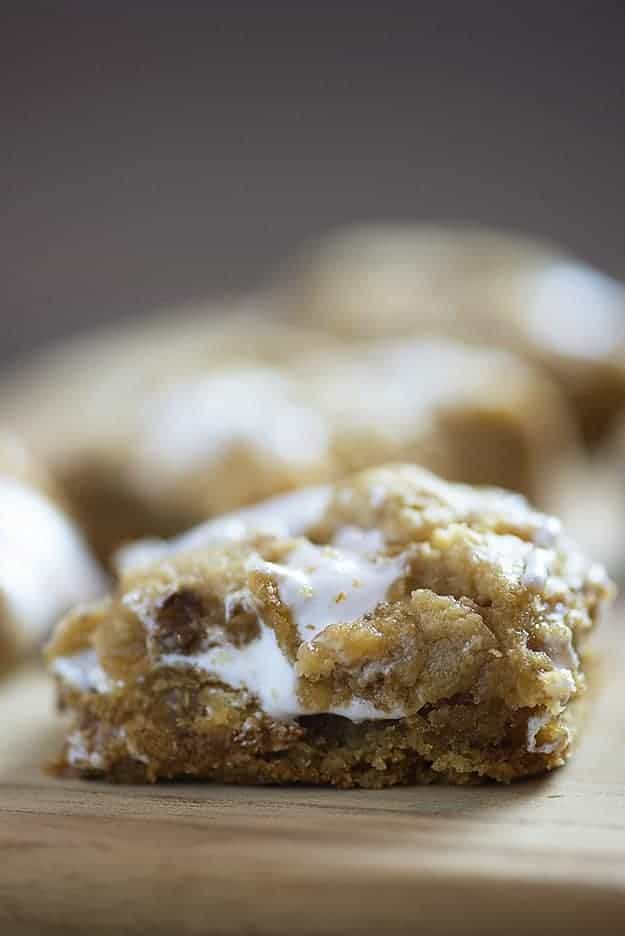 A close up of a piece of a fluffernutter cookie bar.